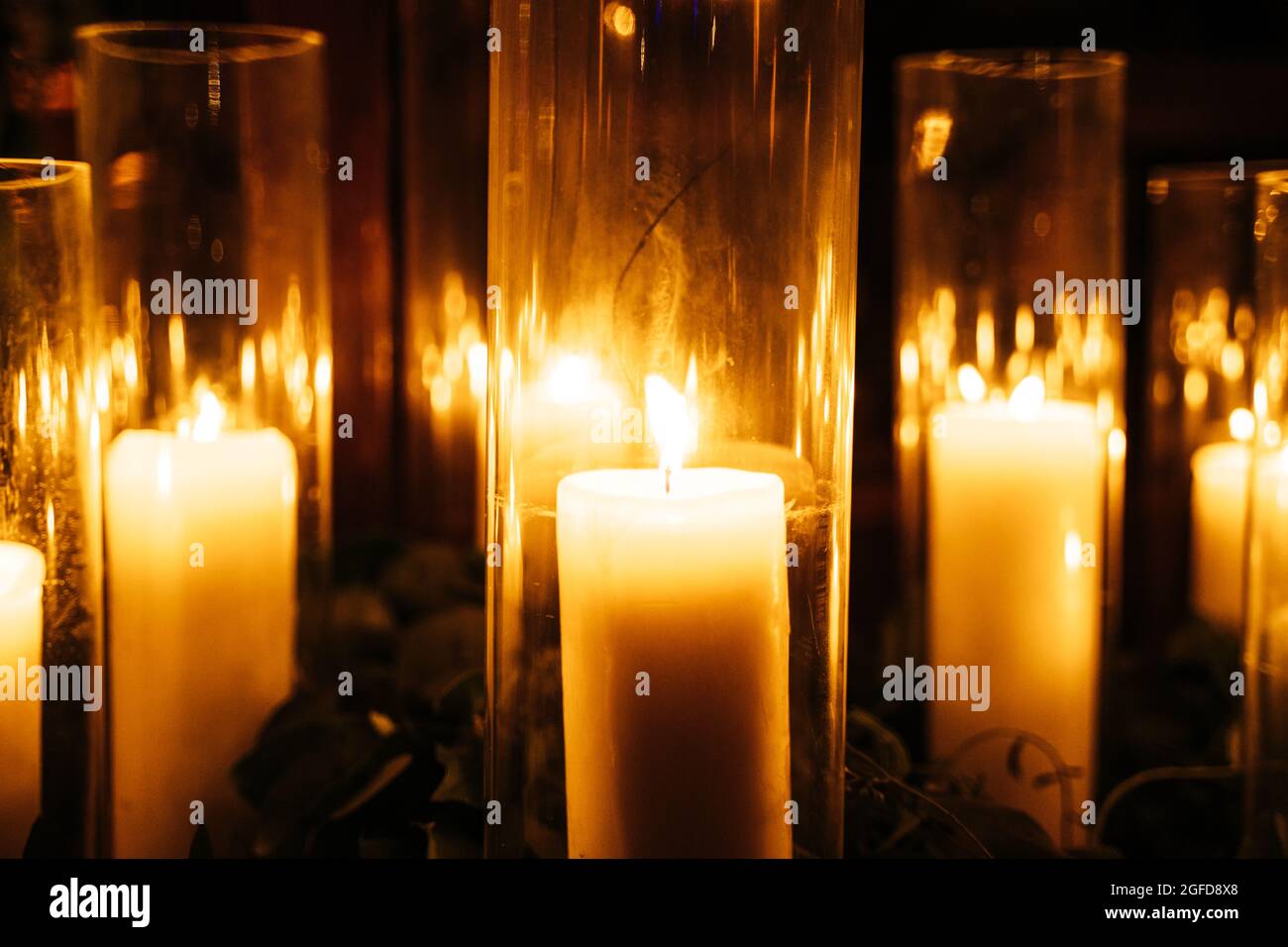 Dark room with lit candles decorating it Stock Photo Alamy