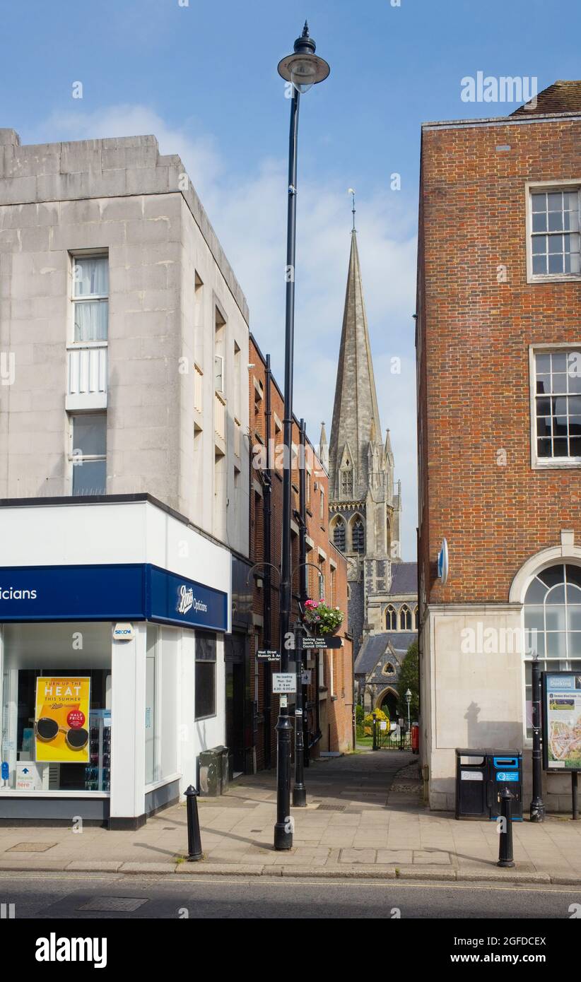 St Martins church in Dorking viewed from the High Street Stock Photo