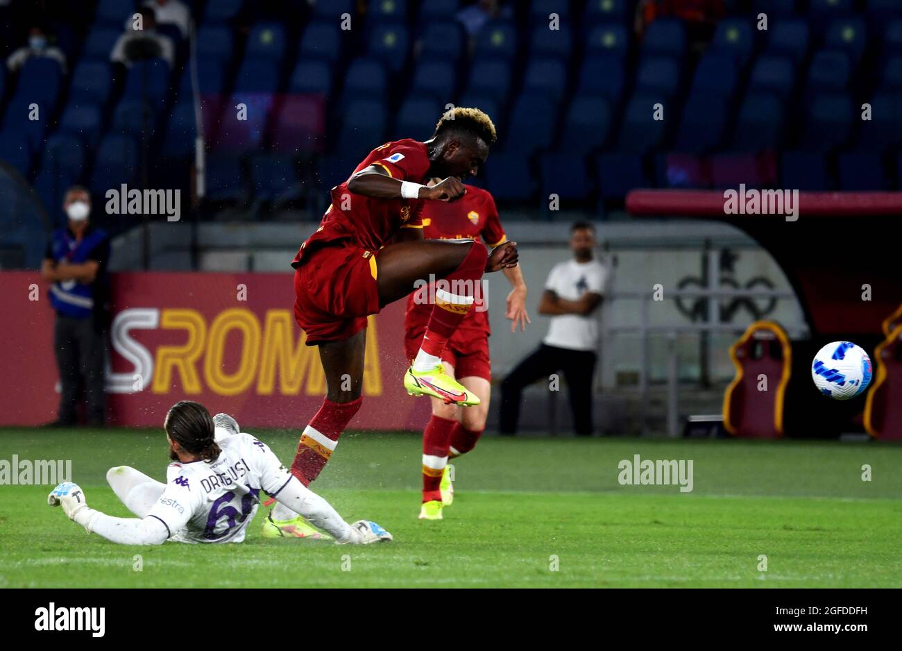 ROME, ITALY - AUGUST 22: Bartlomiej Dragowski of ACF Fiorentina commits a foul on Tammy Abraham of AS Roma and is sent off by the referee ,during the Serie A match between AS Roma v ACF Fiorentina at Stadio Olimpico on August 22, 2021 in Rome, Italy. (MB Media) Stock Photo