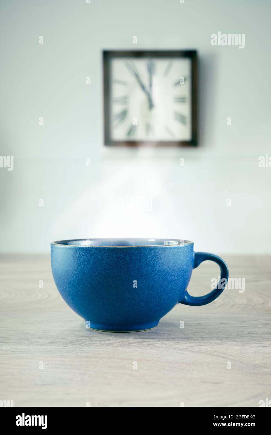 Cup of coffee at eleven O'Clock. Stock Photo