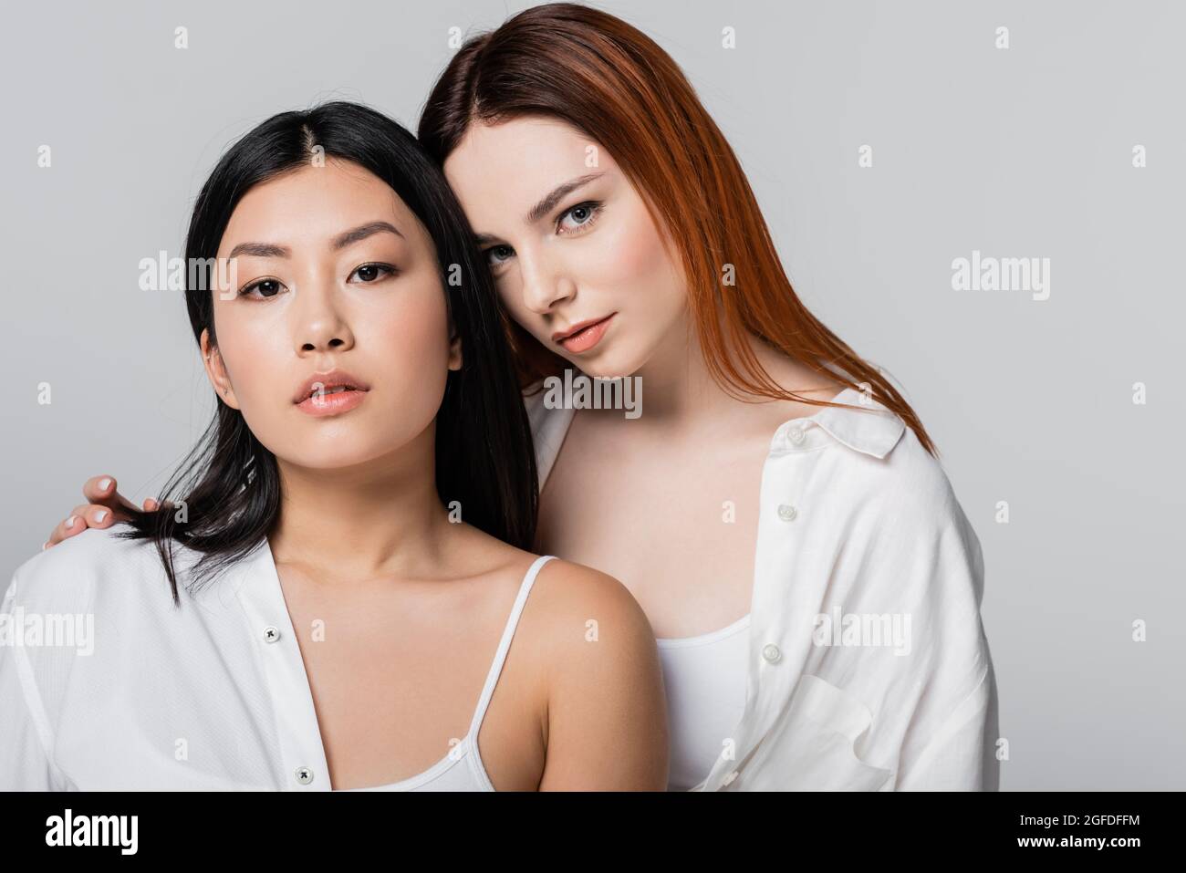 Redhead and brunette women hi-res stock photography and images