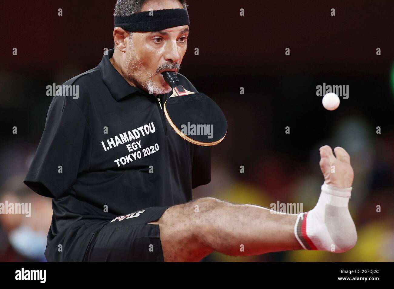 Tokyo, Japan, Aug. 25, 2021, Egypt's Ibrahim Elhusseiny Hamadtou plays against South Korea's Park Hong Kyu in the group round of the men's table tennis singles class 6 at the Tokyo Paralympics on Aug. 25, 2021, at Tokyo Metropolitan Gymnasium. (Kyodo)==Kyodo Photo via Credit: Newscom/Alamy Live News Stock Photo