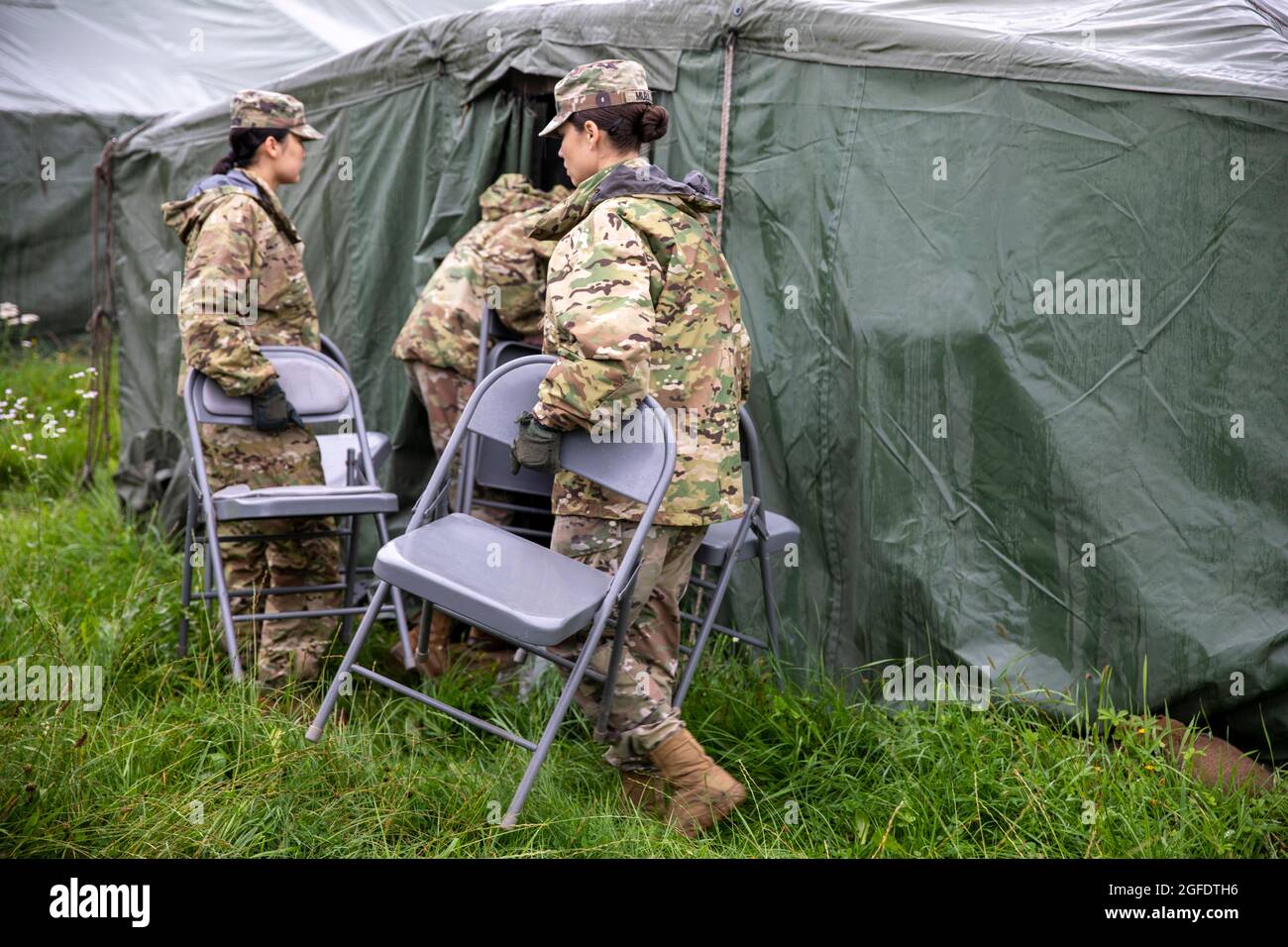 Soldiers assigned to 41st Field Artillery Brigade build tents to make Camp  Kasserine ready to recieve Afghan evacuees in Grafenwohr, Germany Aug. 23,  2021. U.S. Army Europe and Africa is working hand-in-hand