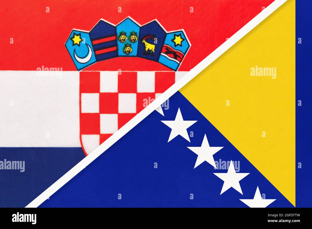 Croatia and Bosnia and Herzegovina, symbol of country. Croatian vs Bosnian national flags. Stock Photo