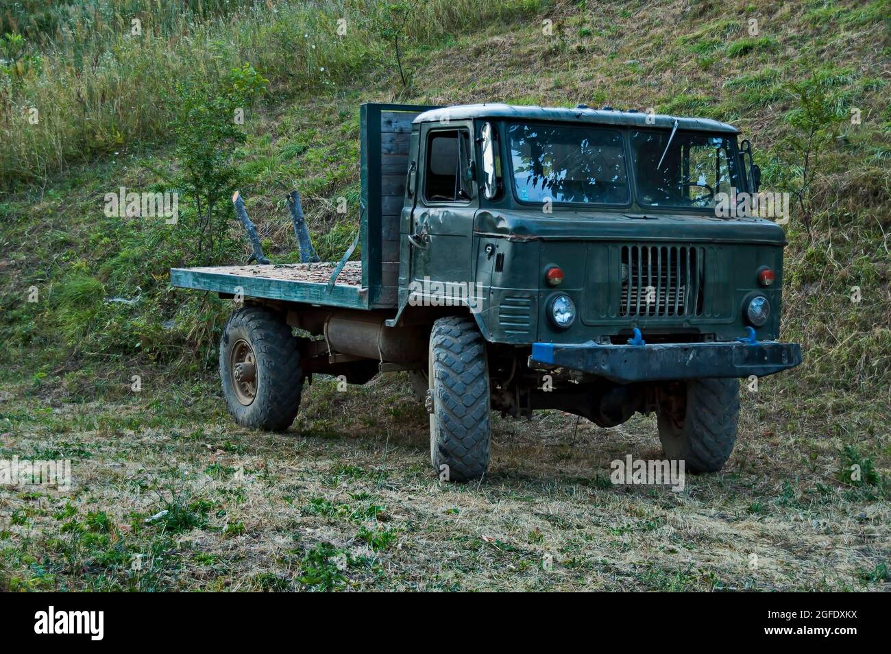 Old military truck, adapted and used for transporting wood from the forest, Vasilyovo, Bulgaria Stock Photo