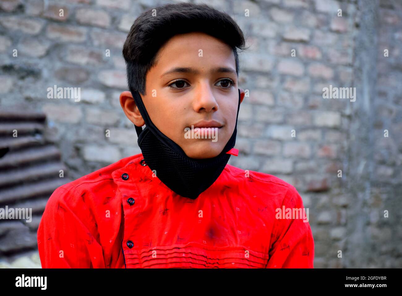 13 years old Asian cute boy wearing protective mask, prevention of