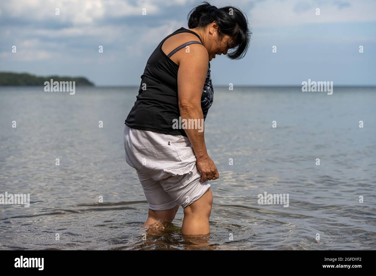 Asian woman 60s hi-res stock photography and images - Alamy