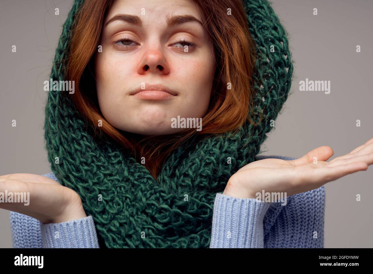 sick woman cold red nose disorder light background Stock Photo - Alamy