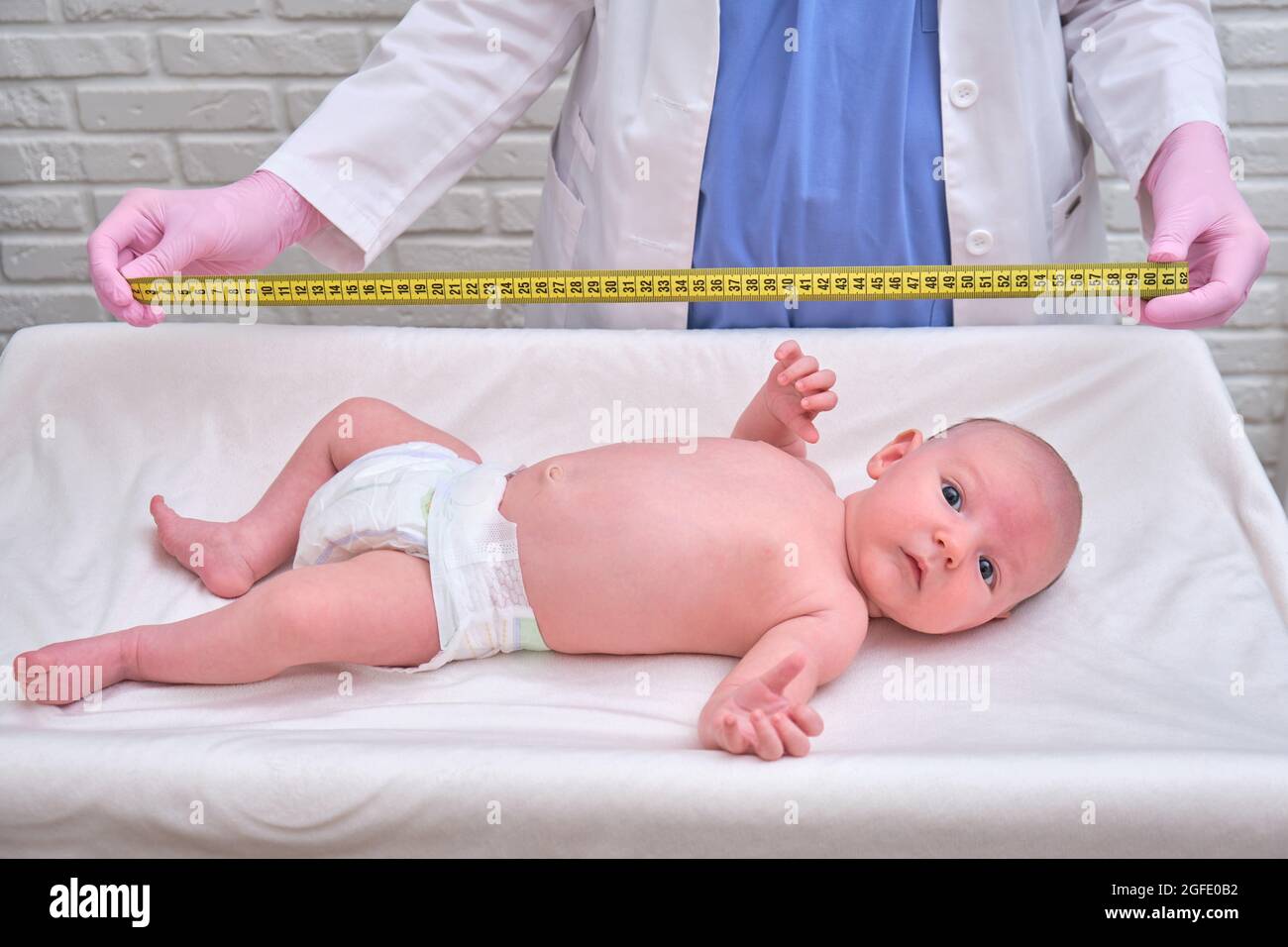 Measuring infant height hi-res stock photography and images - Alamy