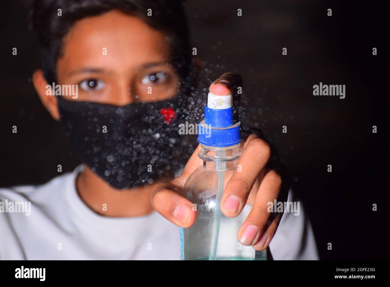 boy with alcohol gel or antibacterial soap sanitizer.Hygiene concept. prevent the spread of germs and bacteria and avoid infections corona virus Stock Photo