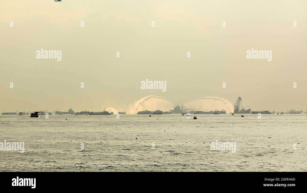 The fire boat spray water into the Bosphorus Stock Photo Alamy