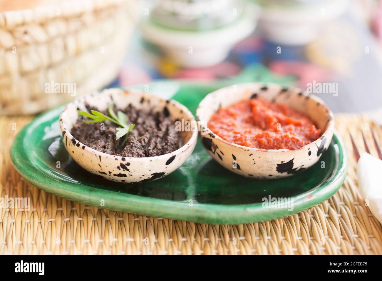 Harissa tomato paste and black olives paste. Appetiser, Morocco Stock Photo
