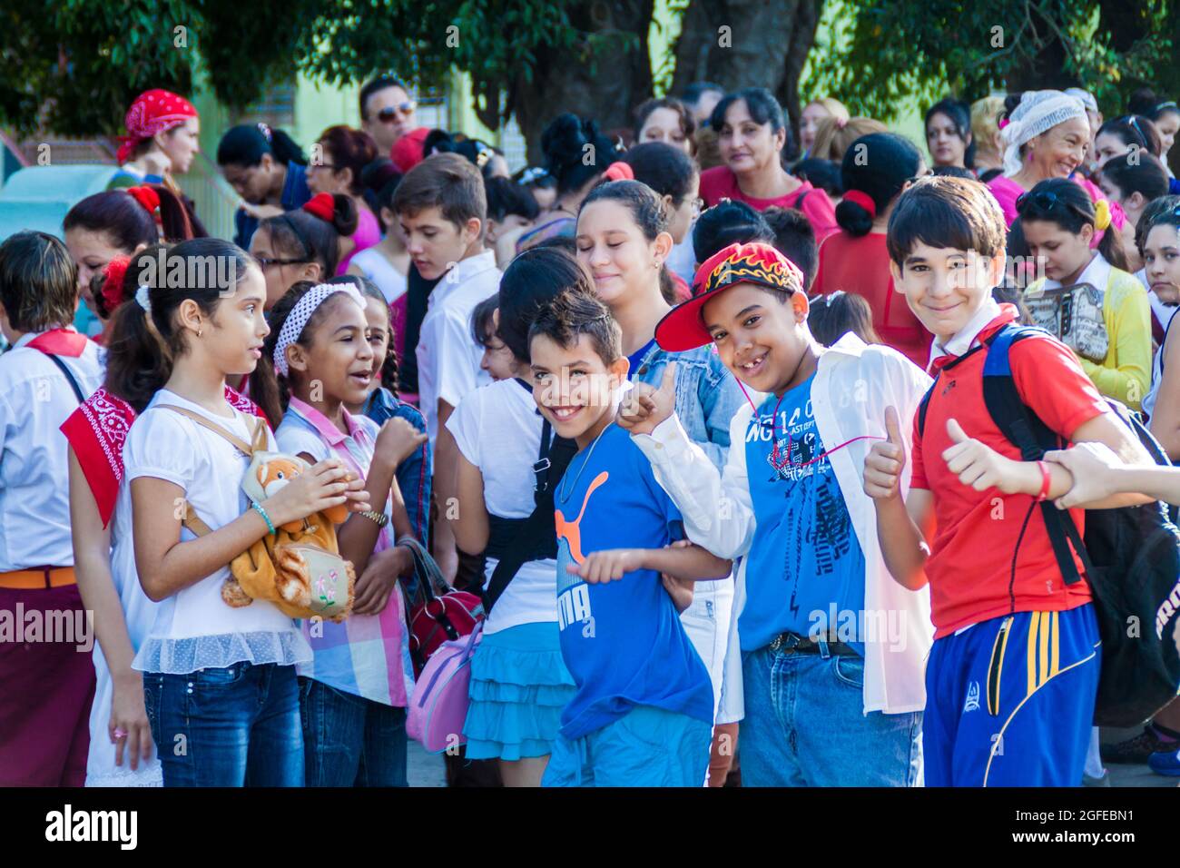 LAS TUNAS, CUBA - JAN 28, 2016: Children prepare for a parade celebrating the birthday of Jose Marti, Cuban national hero. Stock Photo