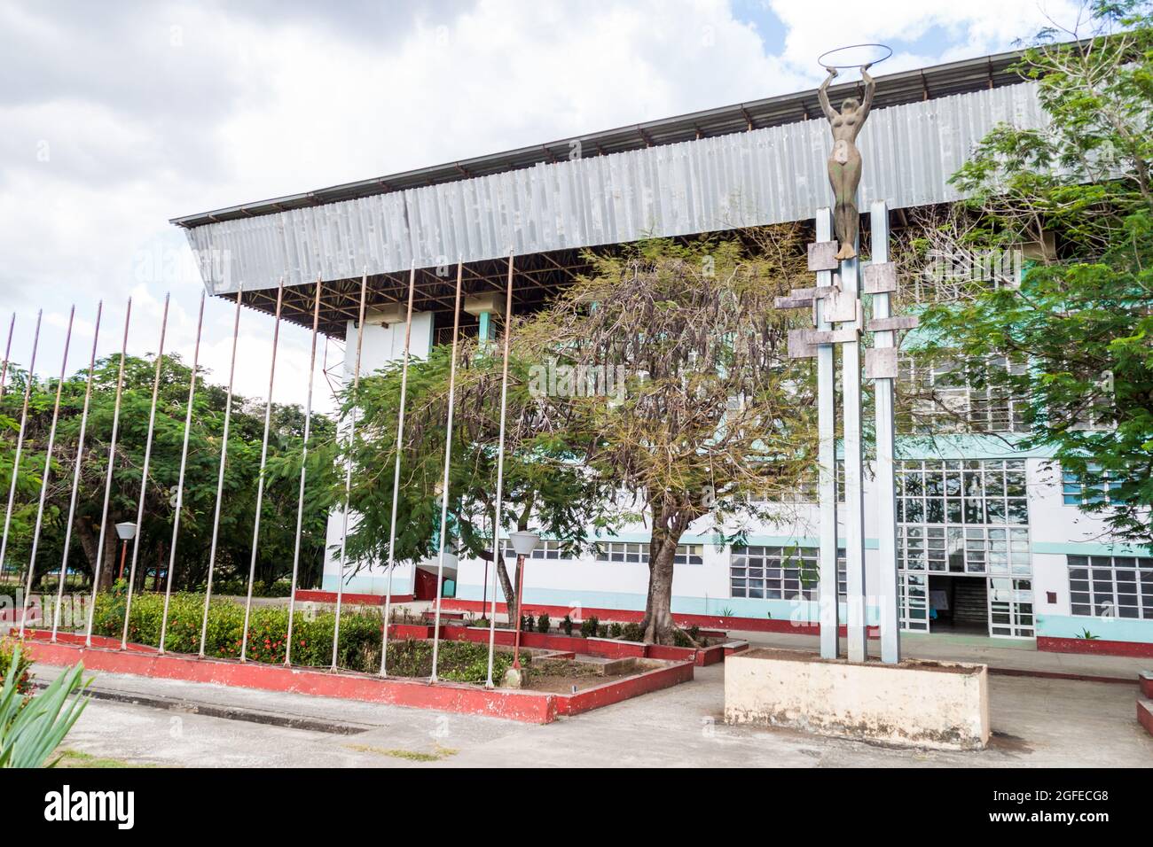 Monument in front of Julio Antonio Mella baseball stadium in Las Tunas,  Cuba Stock Photo - Alamy