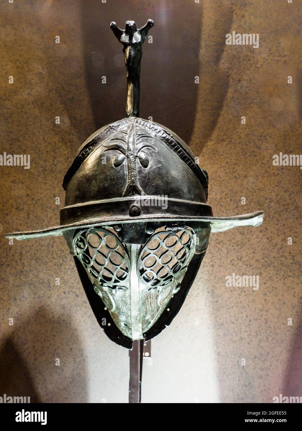 Tracian gladiator's bronze helmet with depiction of a palm tree- Gladiatorial barracks, Pompeii first half of the 1st century AD Stock Photo