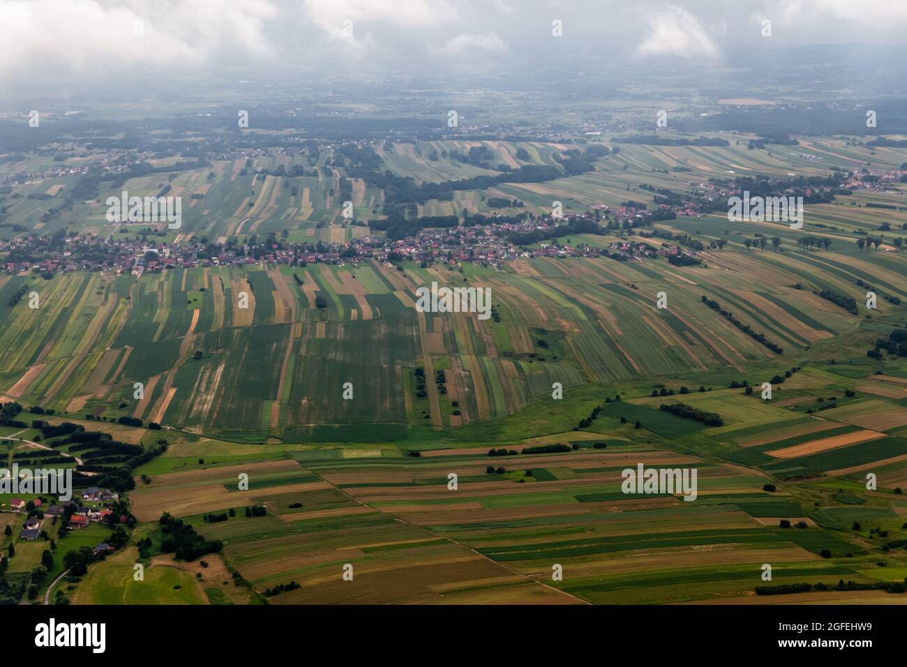 Krakow, Poland. 01st July, 2021. Fields and croplands near Krakow seen from the airplane.Krakow John Paul II International Airport is an international airport located near Krakow, in the village of Balice. It is the second busiest airport of the country in terms of the volume of passengers served annually. Credit: SOPA Images Limited/Alamy Live News Stock Photo