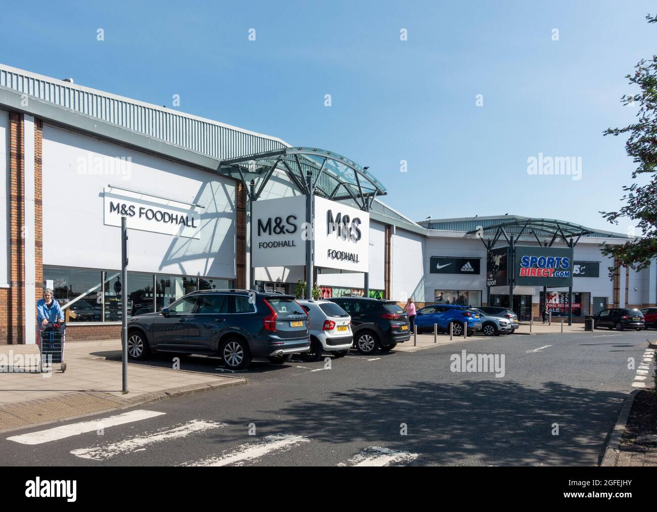 Exterior of M&S Food Hall and Sports Direct shops in Riverway Retail Park, Irvine, North