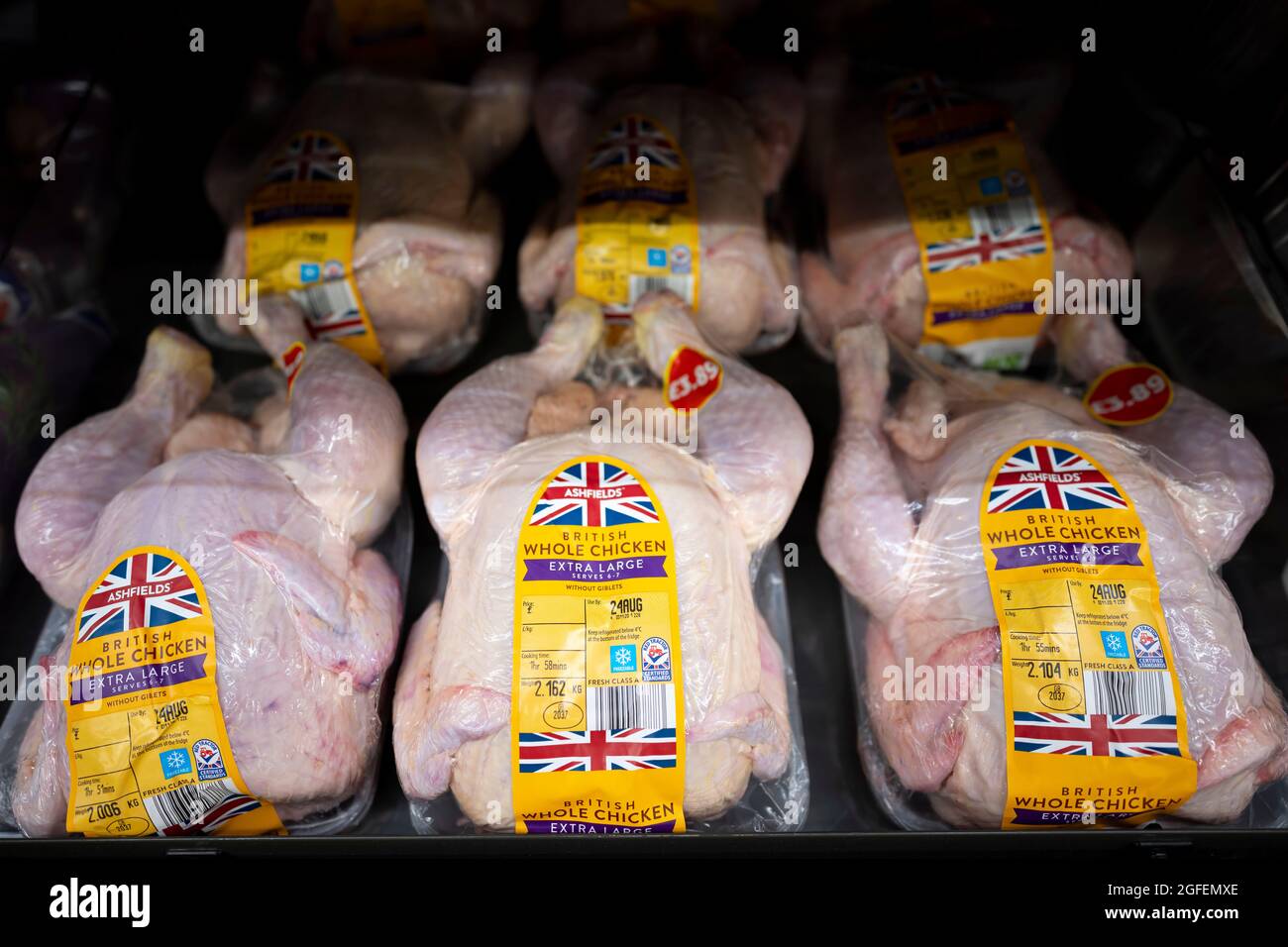 A whole chicken on sale in a supermarket in the UK Stock Photo Alamy