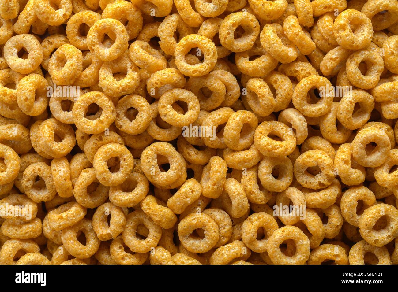 Pile of Loop Oat Breakfest Cereal Background Texture. Stock Photo