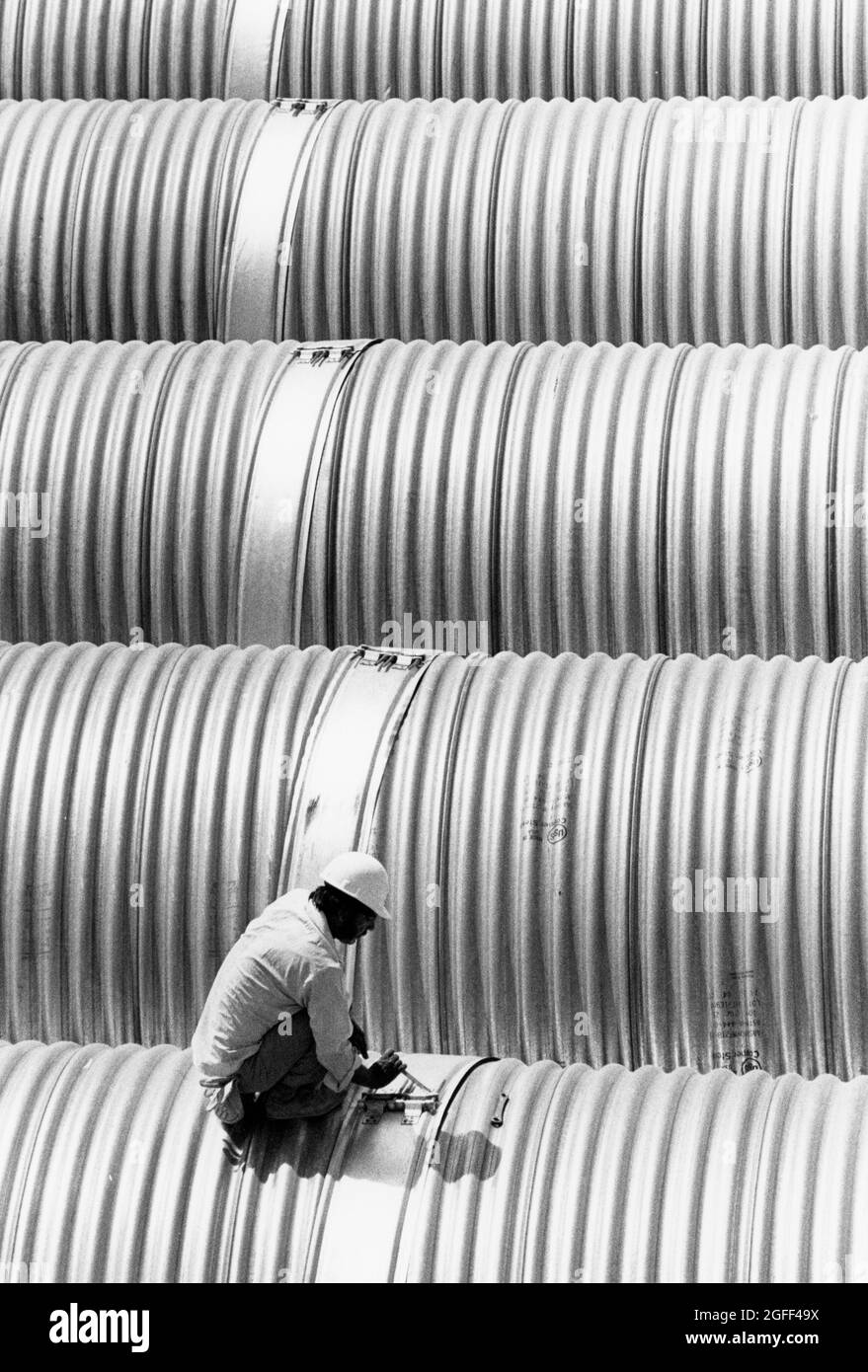 San Antonio Texas USA, circa 1990 Large drainage pipes sit ready for