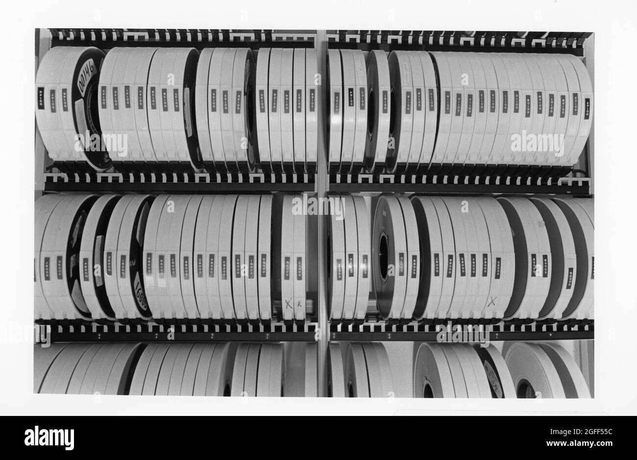 Austin Texas USA, 1990:Racks of magnetic tapes store data entered into computer system to compile data for the United States Census regional data processing center. ©Bob Daemmrich Stock Photo