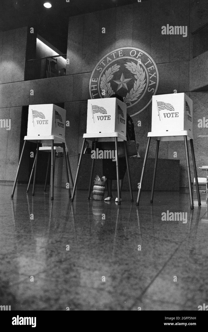 Austin Texas USA, circa 1994: Early voting in Texas, also called extended voting or absentee voting, at the Sam Houston State Office Building in the Capitol complex, catering to state workers during business hours. ©Bob Daemmrich Stock Photo