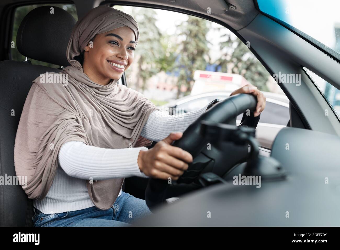 Positive emotions and enjoy buying new car, test drive auto and study Stock Photo