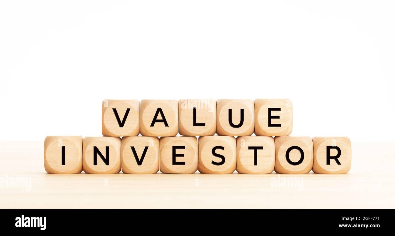 Value investor phrase on wooden block shape. Copy space. White background Stock Photo