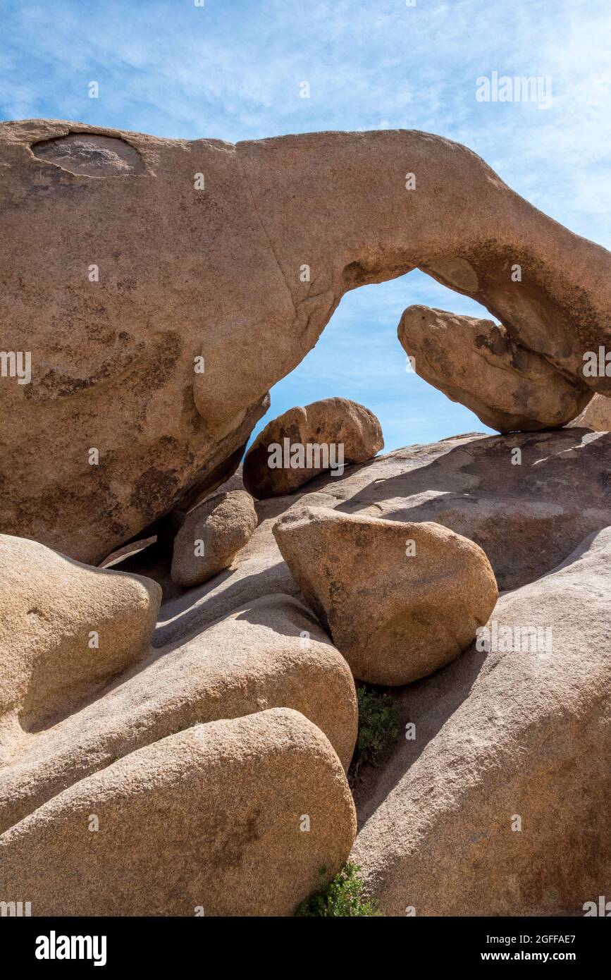 A vertical / portrait shot of Arch Rock without tourists in Joshua Tree National Park. Stock Photo