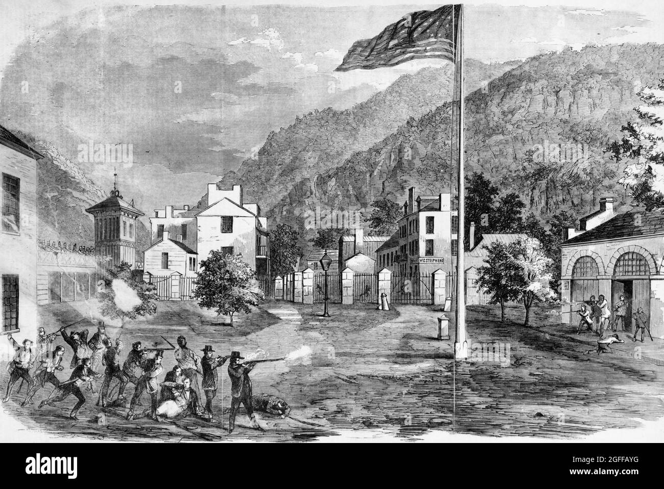 Harper's Ferry insurrection - the battle ground - Captain Alberts' party attacking the insurgents - view of the railroad bridge, the engine-house, and the village, 1859 Stock Photo