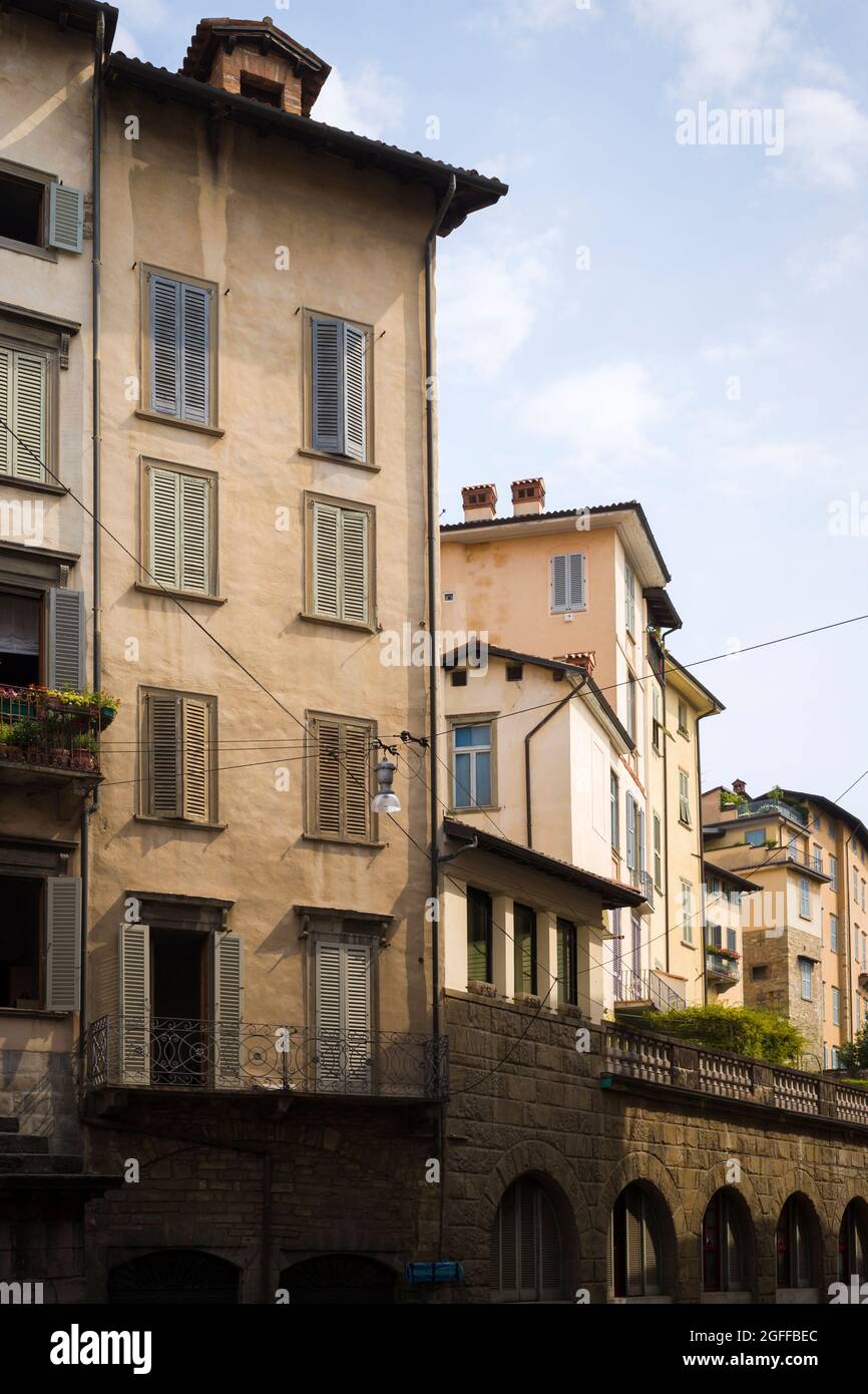 Citta Alta, Bergamo, Italy: typical street scene; clustered palazzos with shuttered windows. Stock Photo