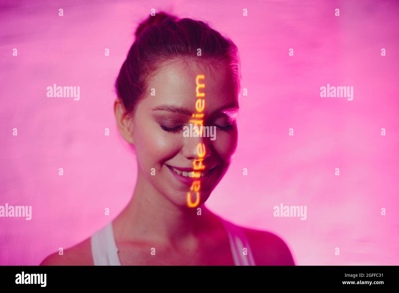 Young Adult Woman With Proverb Words Carpe Diem Translated From Latin Language As Seize The Day On Her Face Stock Photo Alamy