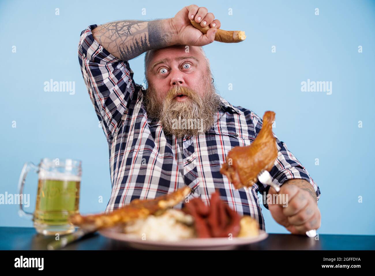 Man overeating funny hi-res stock photography and images - Alamy