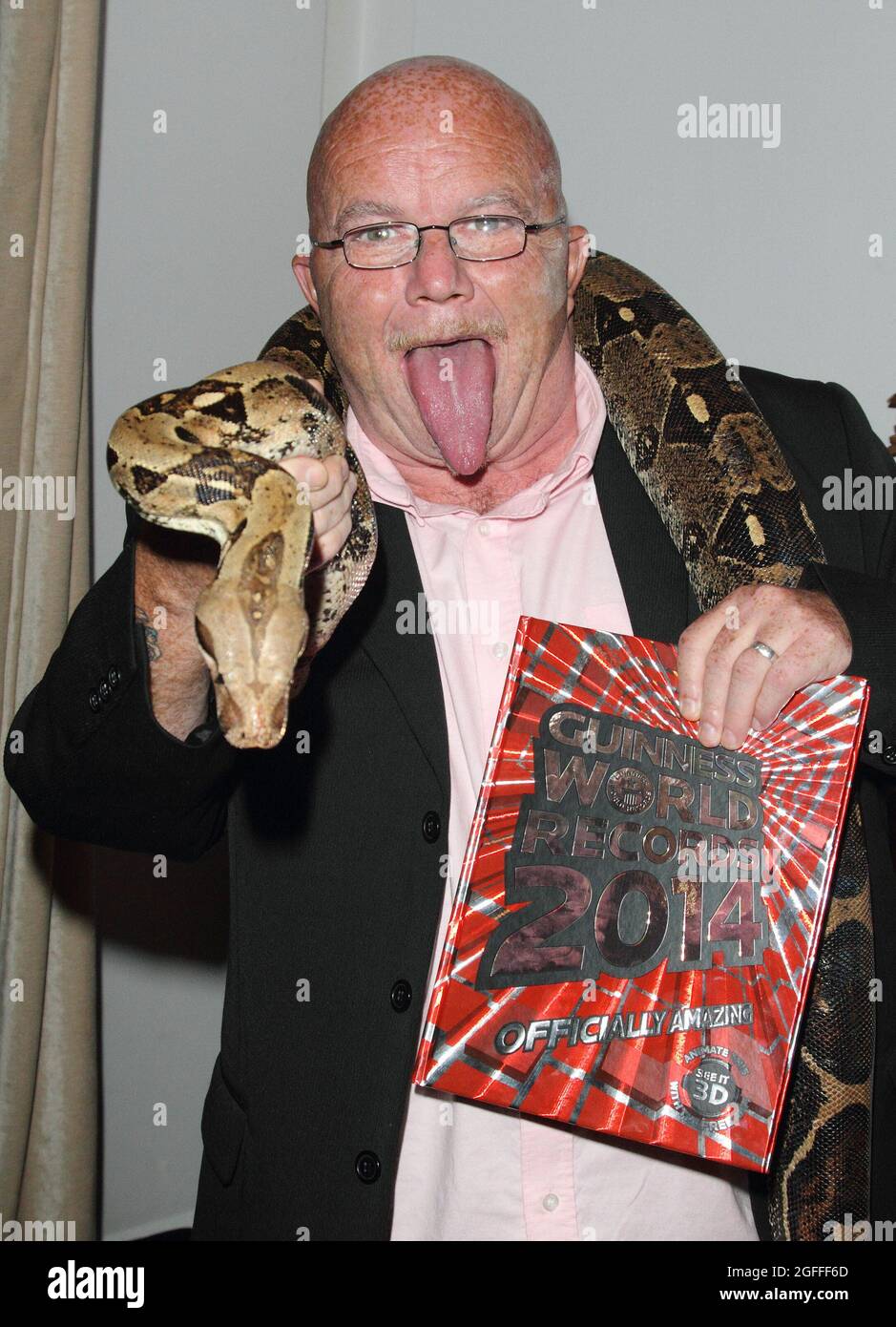London. UK. Stephen Taylor - who has the World's longest tongue at the Guinneook ofk of World Records 2014 Launch Party at One Marylebone, London . 17th September 2013. Ref:LMK73-45305-180913. Keith Mayhen/Landmark London. UK. Stephen Taylor - who has the World's longest tongue at the Guinneook ofk of World Records 2014 Launch Party at One Marylebone, London . 17th September 2013. Ref:LMK73-45305-180913. Keith Mayhen/Landmark