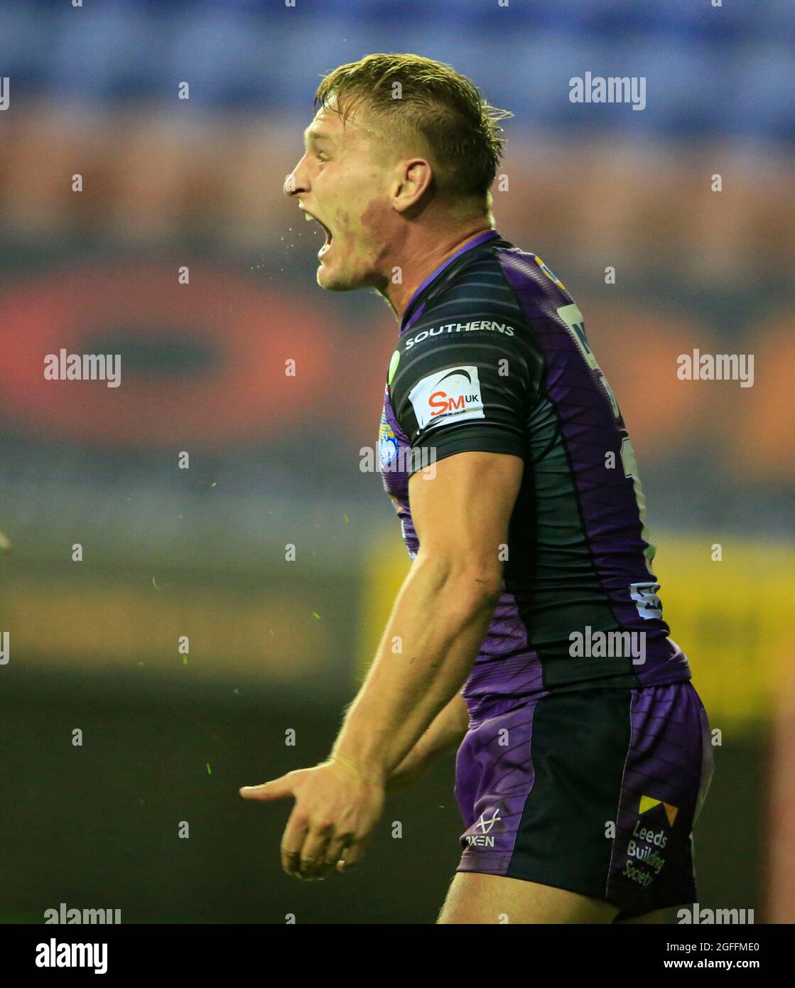 Wigan, UK. 25th Aug, 2021. Brad Dwyer (14) of Leeds Rhinos celebrates his try in Wigan, United Kingdom on 8/25/2021. (Photo by Conor Molloy/News Images/Sipa USA) Credit: Sipa USA/Alamy Live News Stock Photo
