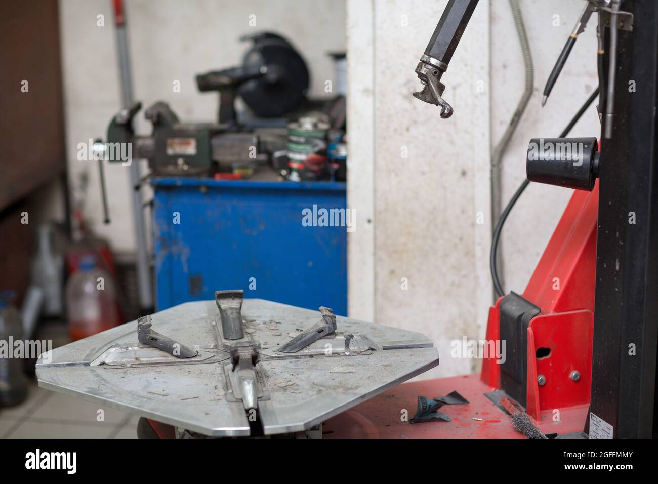 Machine for changing car tire fitting. Wheel tyre repairing Stock Photo ...