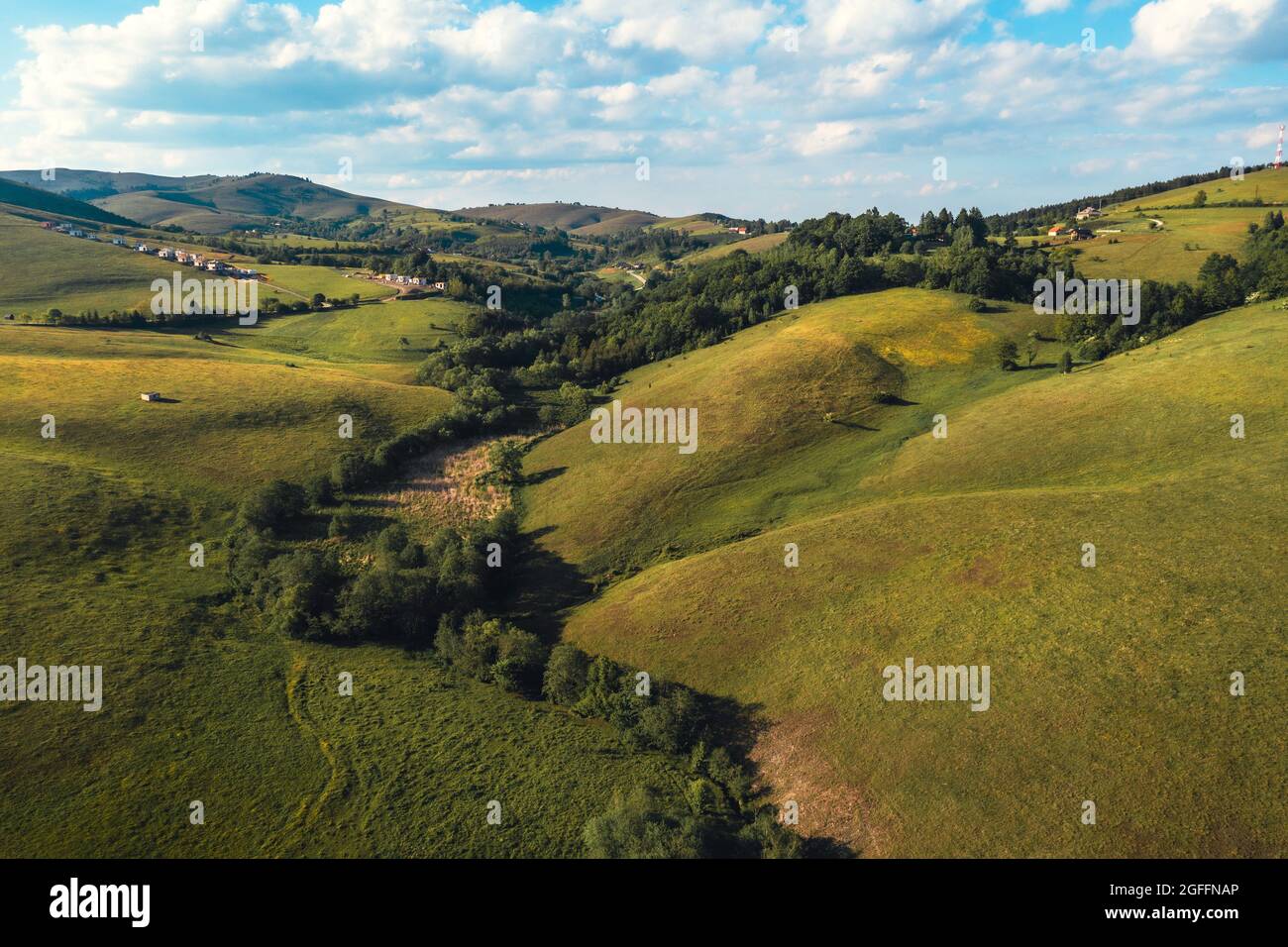 Zlatibor hills landscape in summer from above, aerial drone photography of green pasture land and woods Stock Photo