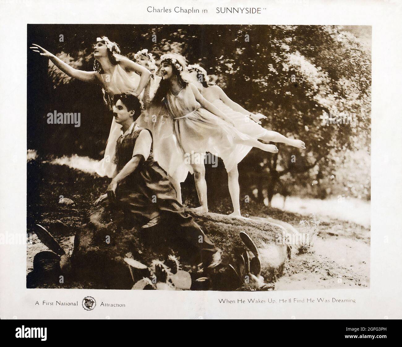 Photo of Charlie Chaplin in Sunny Side. Press photo. 1919. Stock Photo