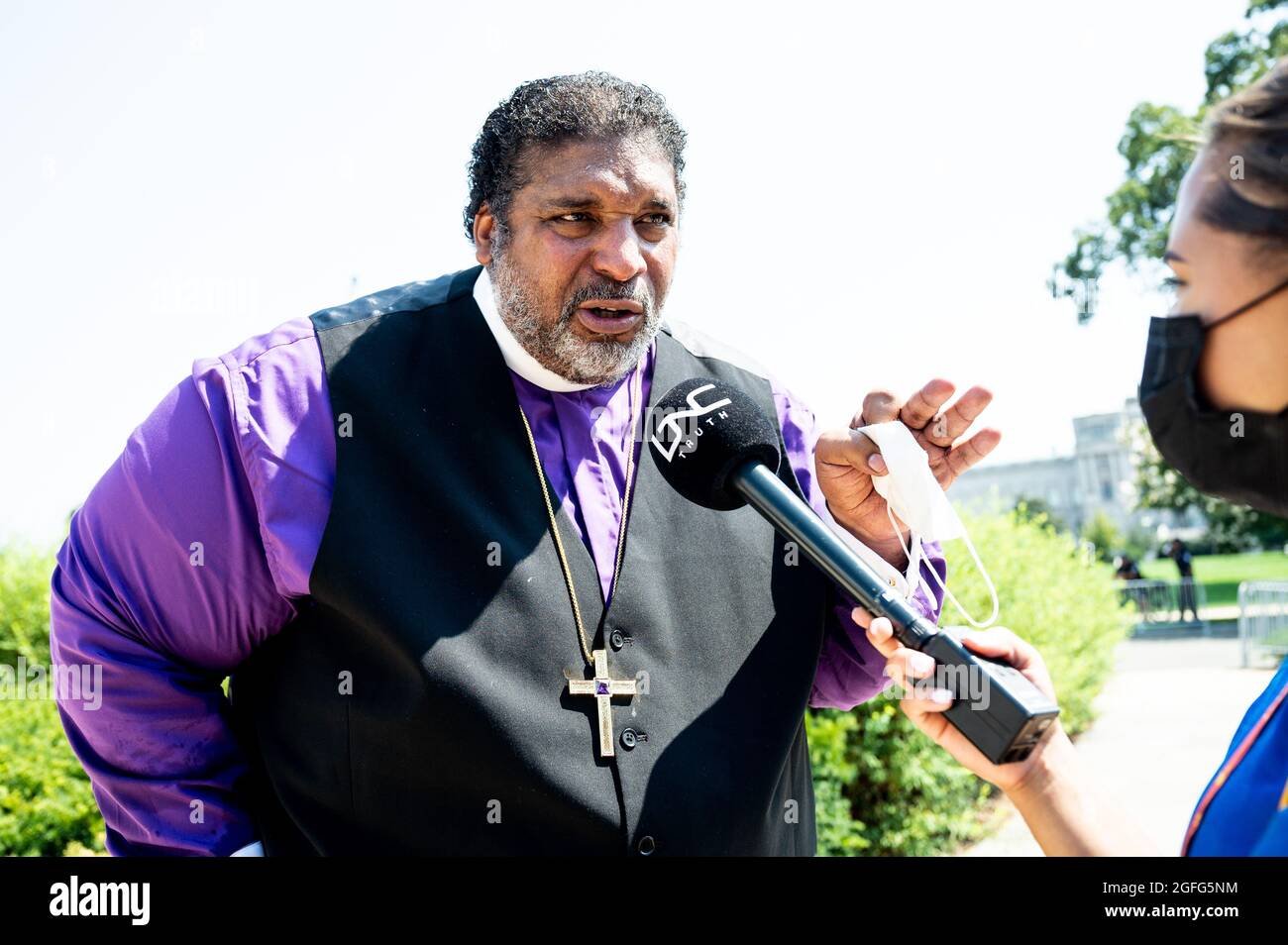 Washington, United States. 25th Aug, 2021. Reverend William Barber II speaking to a reporter outside the U.S. Capitol. Credit: SOPA Images Limited/Alamy Live News Stock Photo