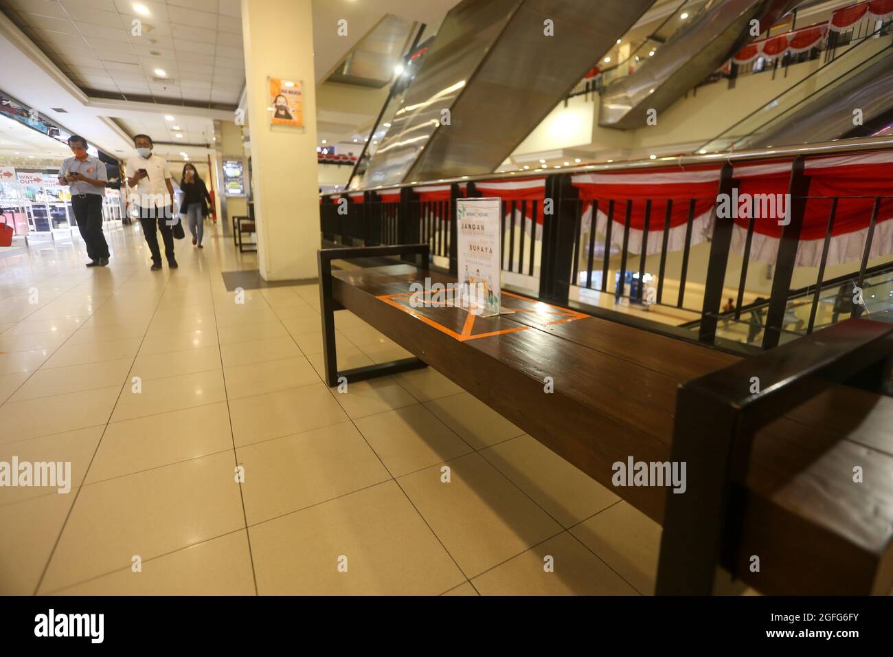 Bogor, Indonesia. 24th Aug, 2021. (8/24/2021) The shopping center in Bogor City has started operating on the condition that visitors must scan the vaccination barcode to enter the Botani Square Mall, Bogor City. The implementation of Community Activity Restrictions (PPKM) in Bogor City has decreased from level 4 to level 3. (Photo by Fadli Akbar/Pacific Press/Sipa USA) Credit: Sipa USA/Alamy Live News Stock Photo