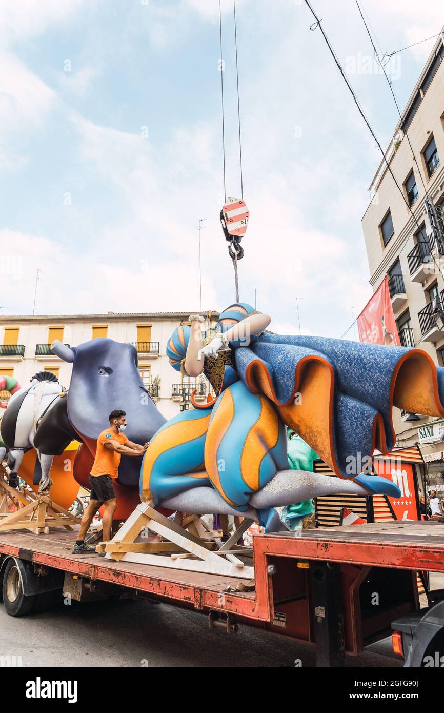 Valencia, Spain - August, 2021: Las Fallas of Valencia returns in 2021 after the coronavirus COVID-19 pandemic. Various parts of a Falla being assembl Stock Photo