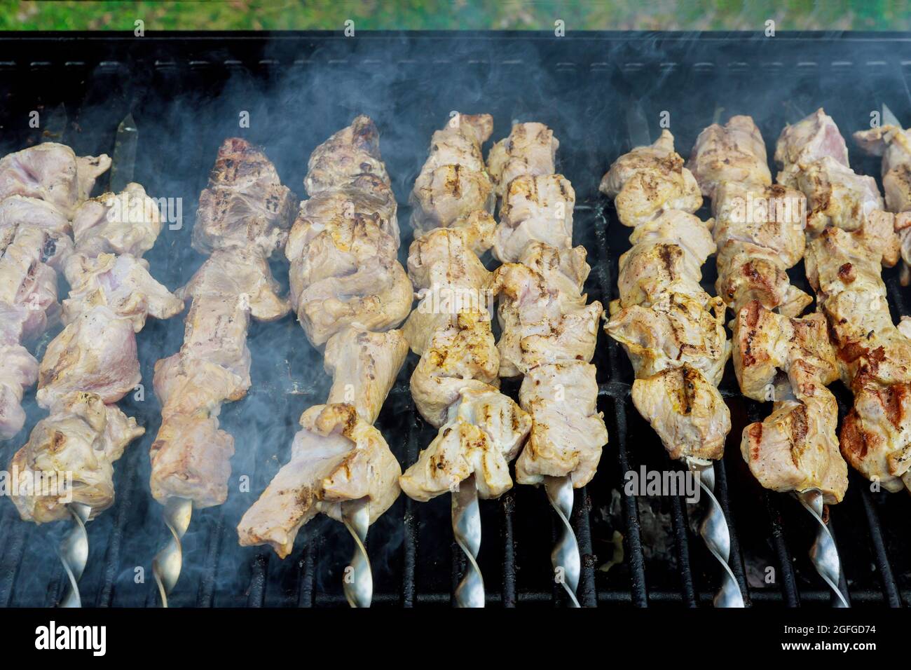 Process of frying meat on charcoal in the skewer are fried a classic