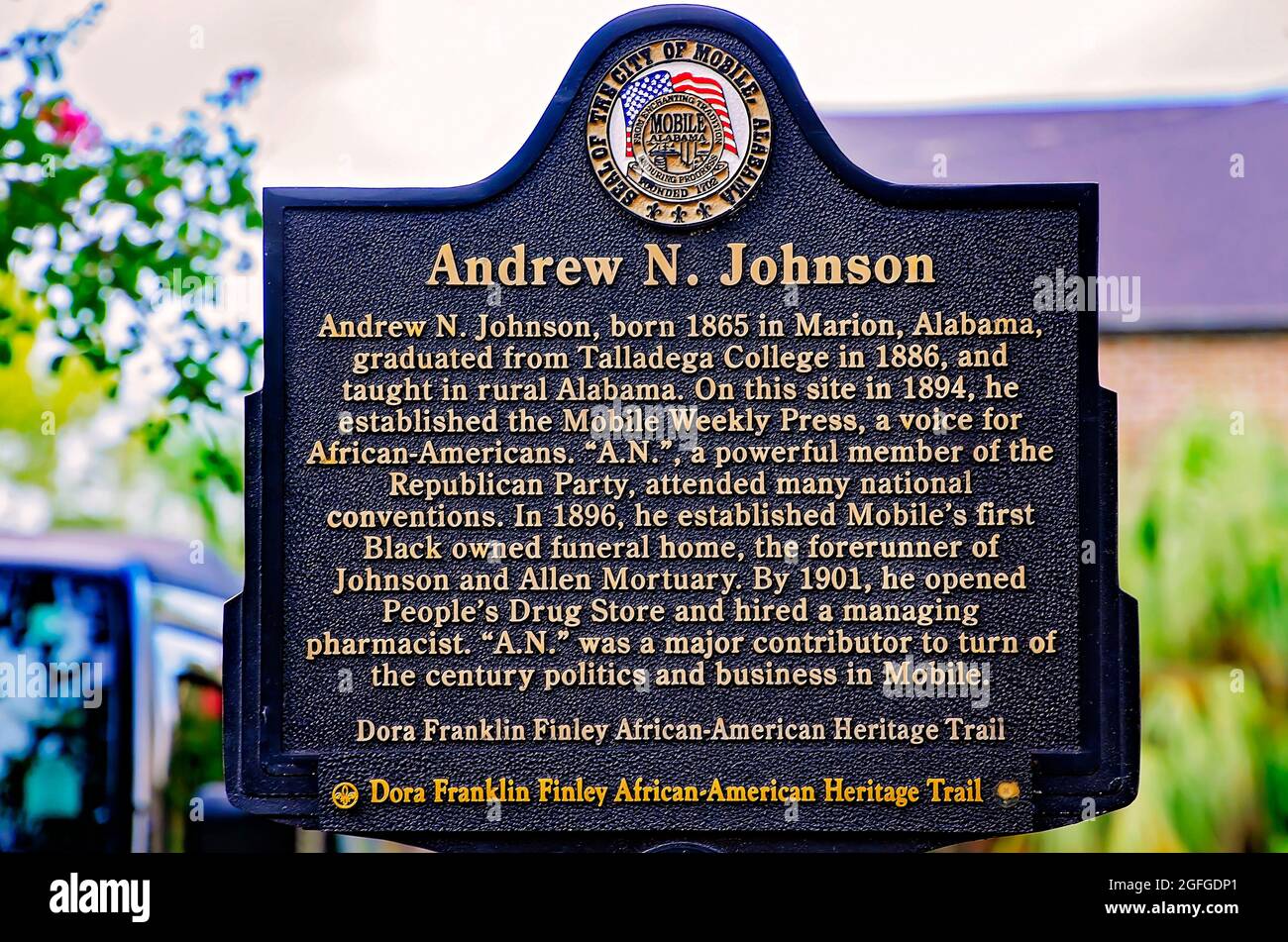 A historic marker stands where prominent African-American Andrew N. Johnson operated the Mobile Weekly Press, a black newspaper, in Mobile, Alabama. Stock Photo