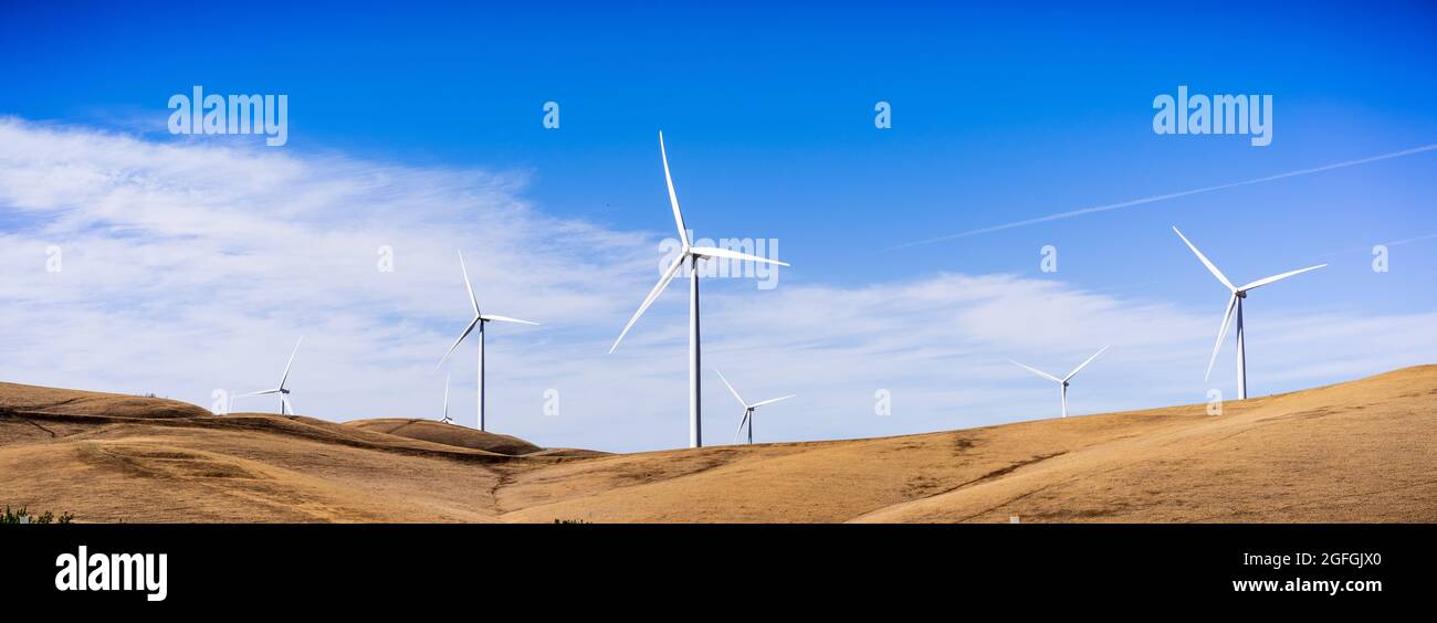 Panoramic view of wind turbines on the top of golden hills in Contra Costa County, East San Francisco bay area, California Stock Photo
