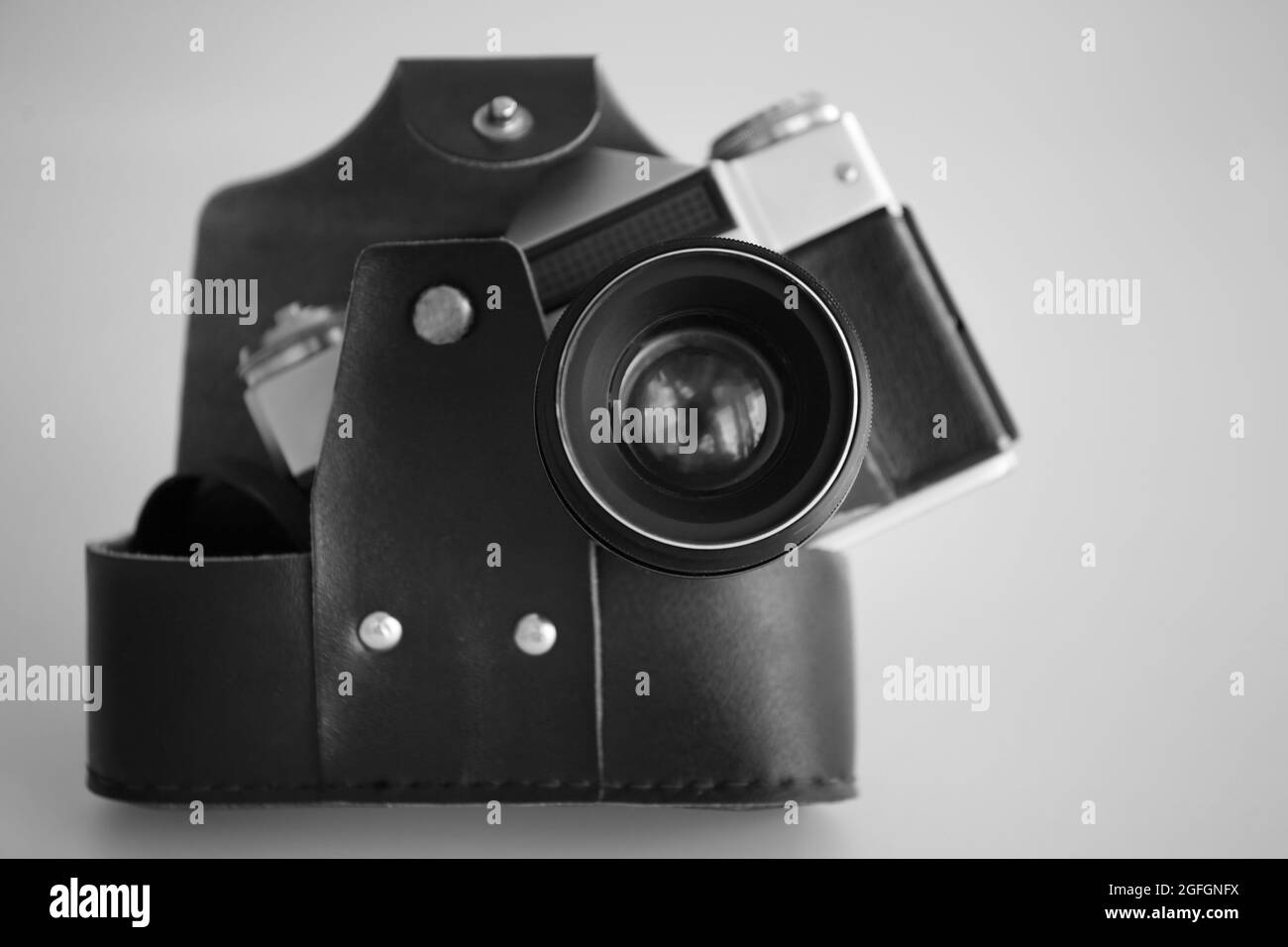 Vintage camera in case on white background Stock Photo - Alamy