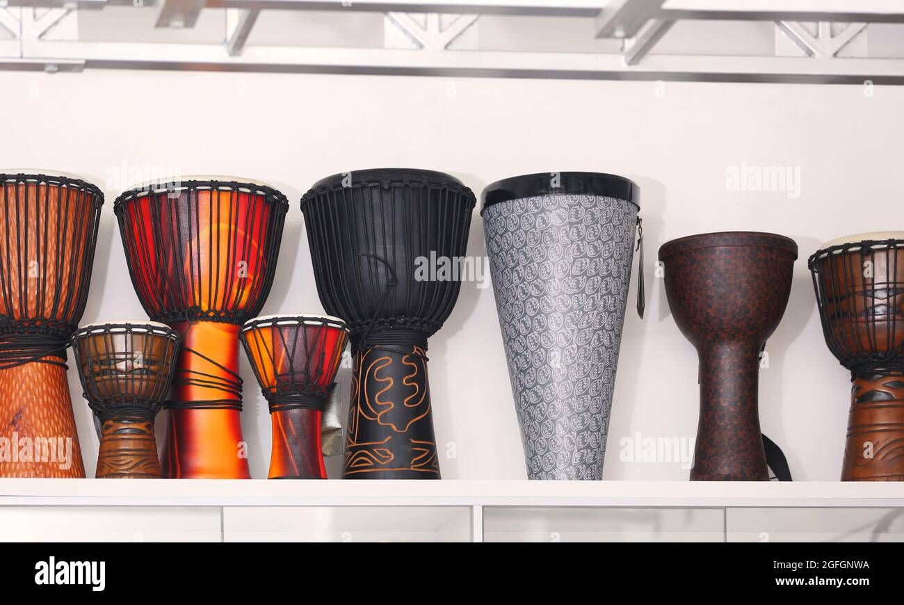 Darbuka drums in music shop Stock Photo Alamy