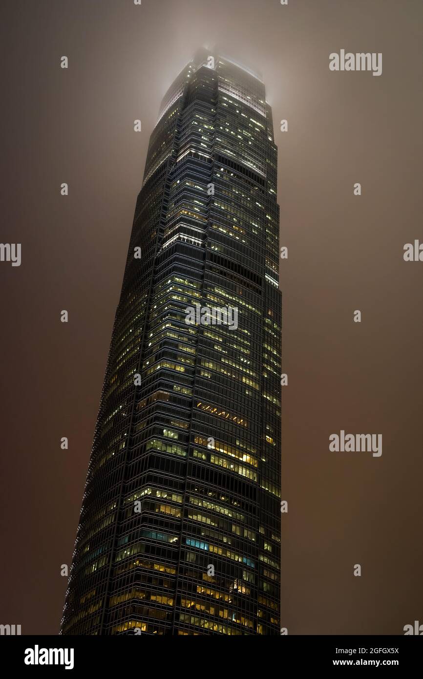 Architecture, Architectural2ifc, Hong Kong Island's tallest building, in mist, at night Stock Photo