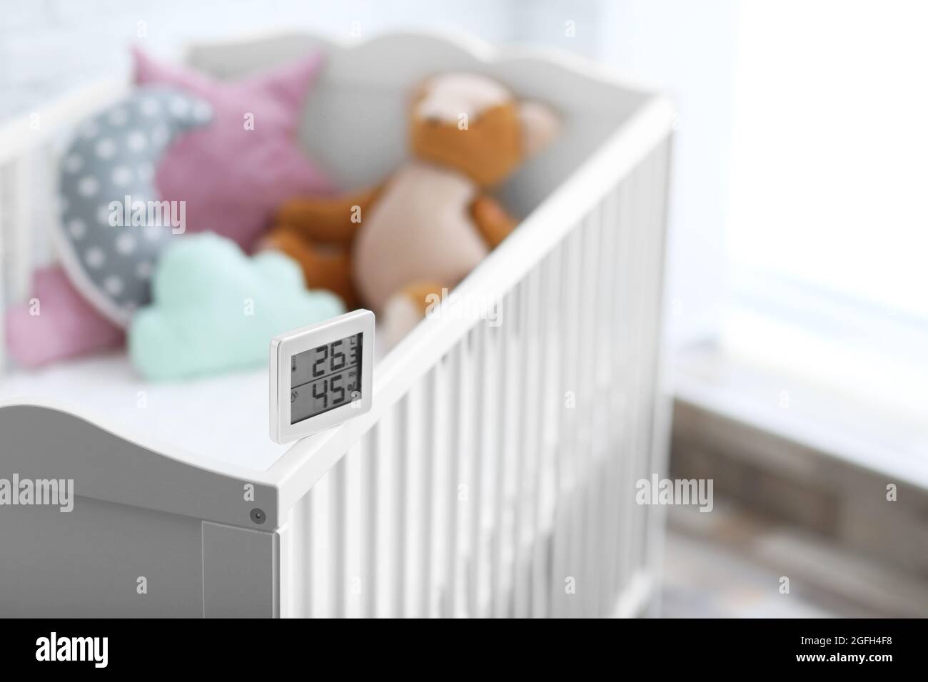 Digital temperature and humidity control in baby room Stock Photo Alamy