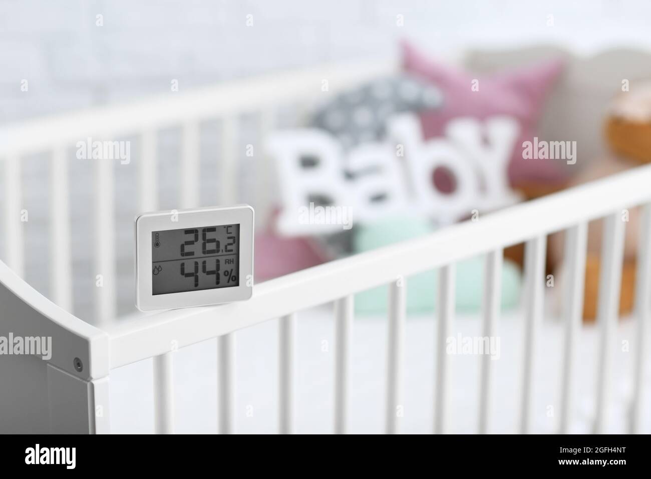 Digital temperature and humidity control in baby room Stock Photo Alamy