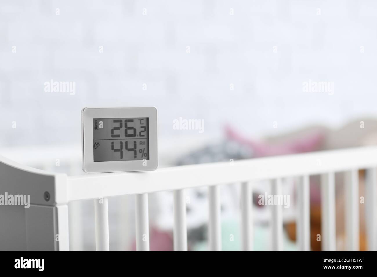 Digital temperature and humidity control in baby room Stock Photo - Alamy